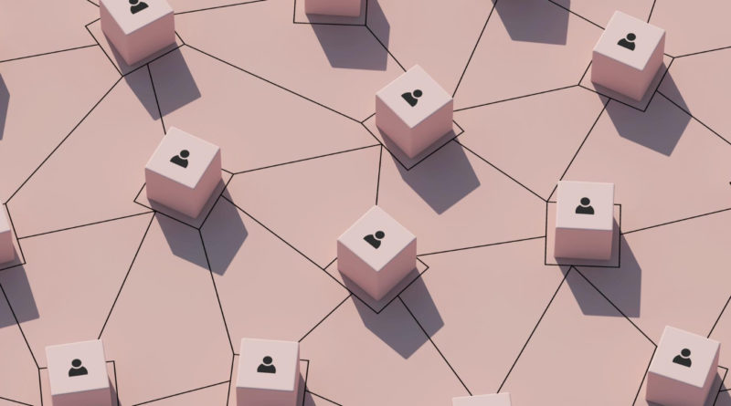 Une vue en plongée d'un réseau interconnecté composé de petits cubes rose pâle reliés par des lignes noires